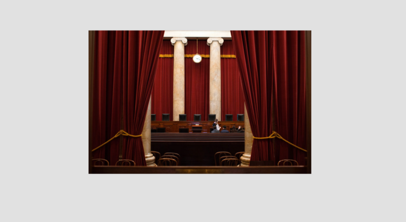 Image showing a curtain being pulled to reveal the US Supreme Court Chamber